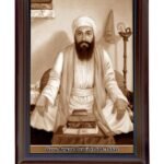 Dhan Dhan Sri Guru Angad Dev Ji's photo with brown frame